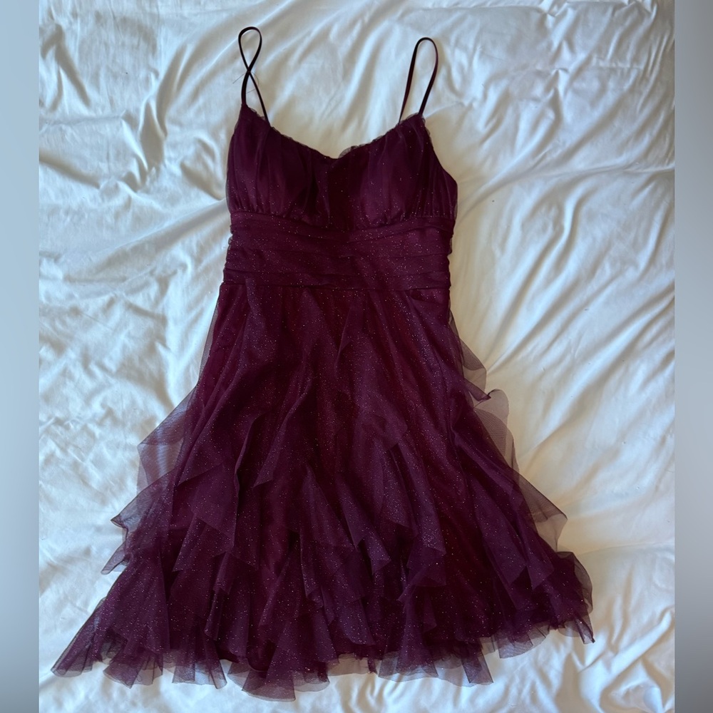 Burgundy, glittery homecoming dress with corset synch and ruffles